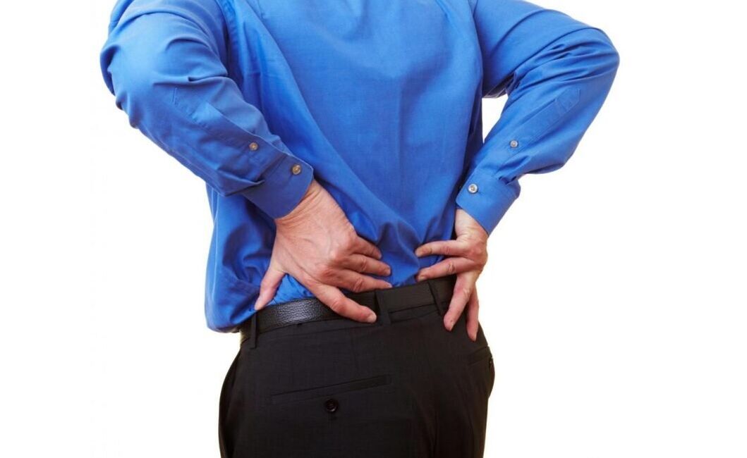 болки в гърба в лумбалната област снимка 1
